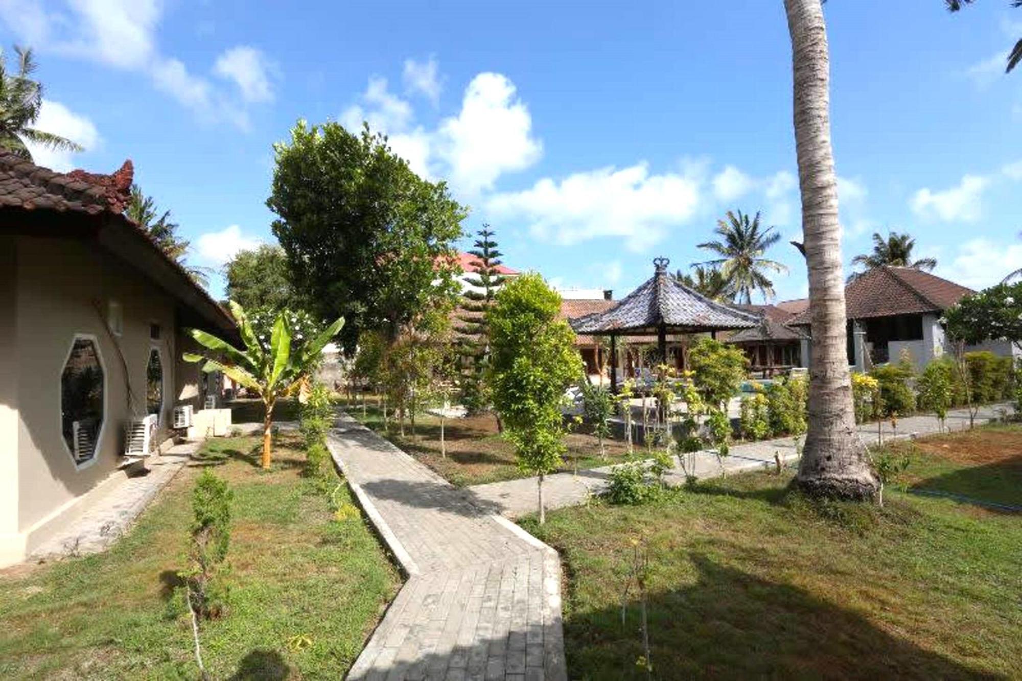 Gguesthouse Kuta  Esterno foto