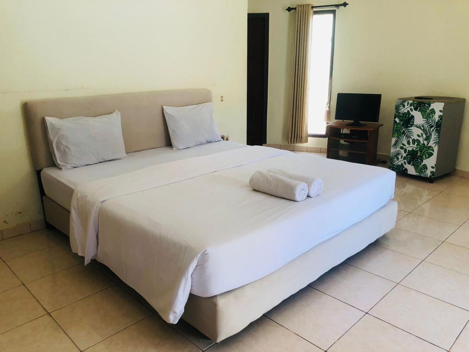 Gguesthouse Kuta  Esterno foto